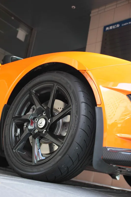 Closeup of a Tesla Roadster Sport's rim.